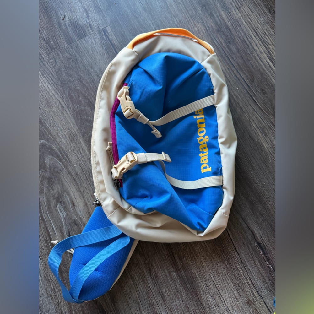 Patagonia Blue and Tan cross body Backpack